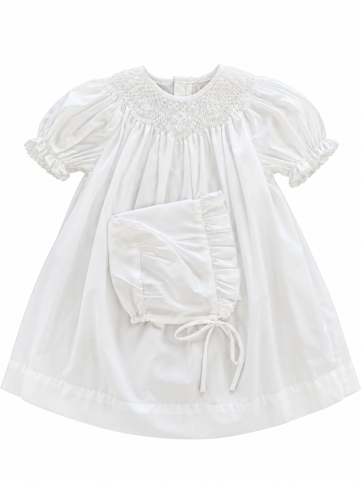 White bishop smocked christening dress with smocked crosses