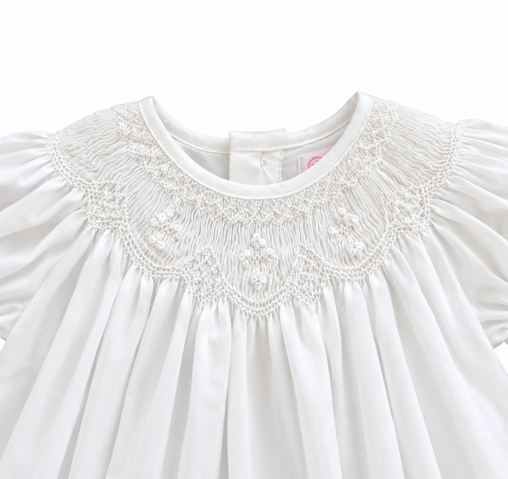 Christening dress with matching bonnet, bishop smocking detail