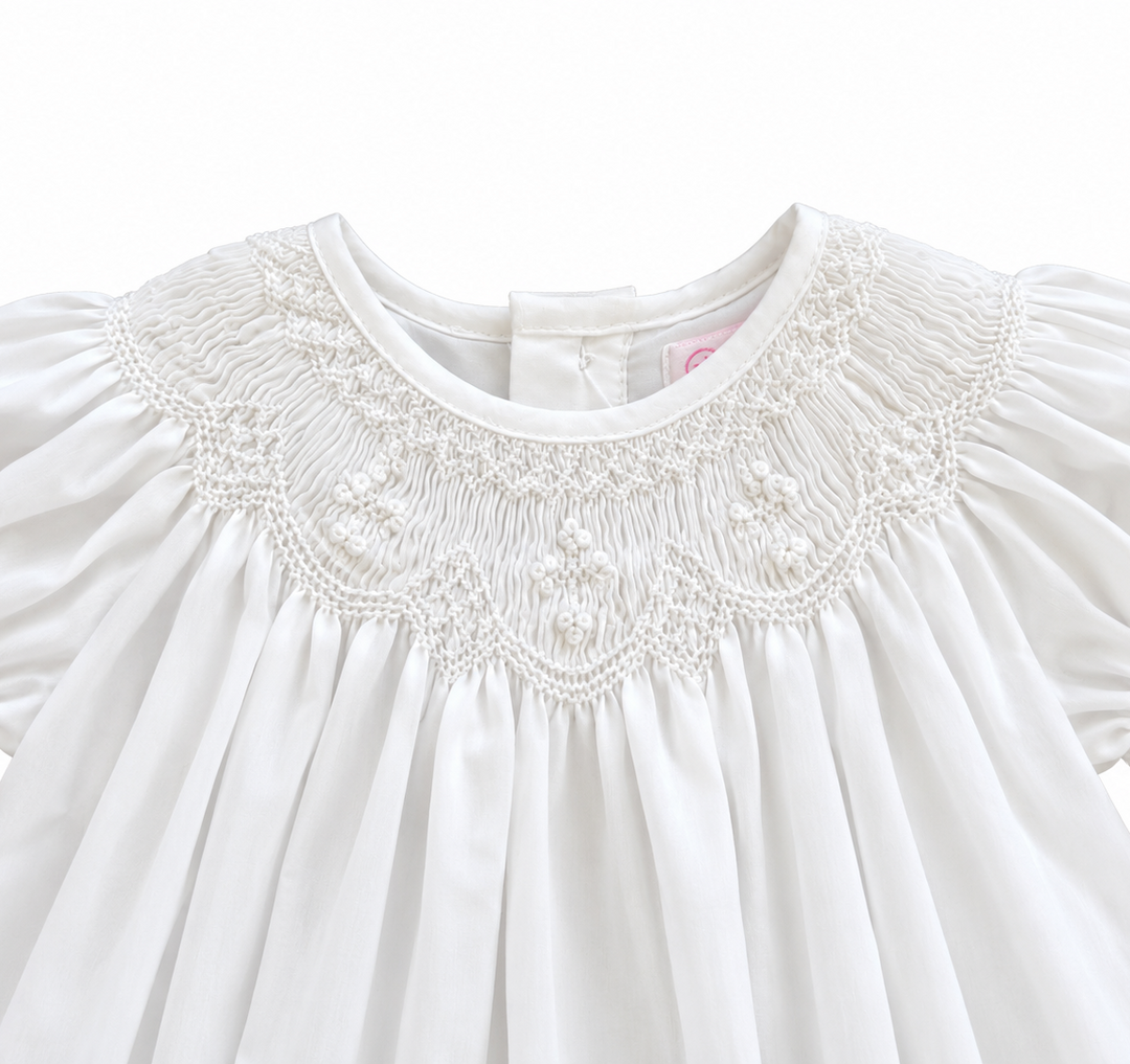 Christening dress with matching bonnet, bishop smocking detail