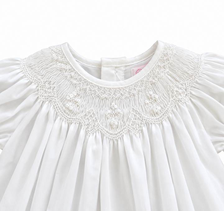Christening dress with matching bonnet, bishop smocking detail
