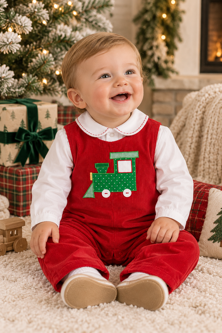 Boys red corduroy longall with green train appliqué – detail view